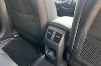 Innenraumaufnahme des KIA E-Niro mit Mittelkonsole und Sitzdetails.